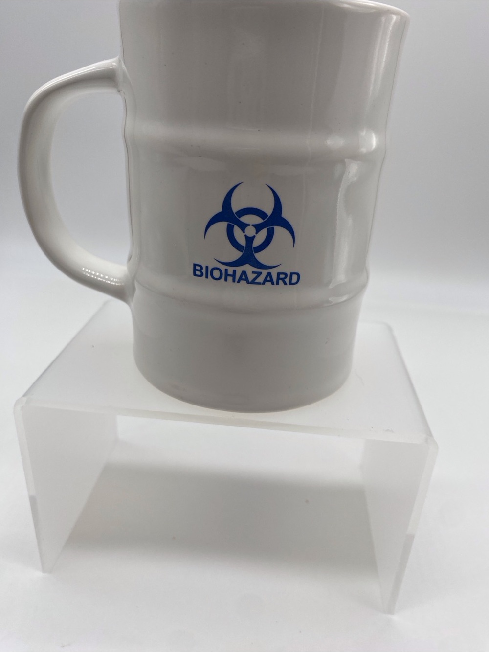 White Ceramic Coffee Mug with Blue Biohazard Logo